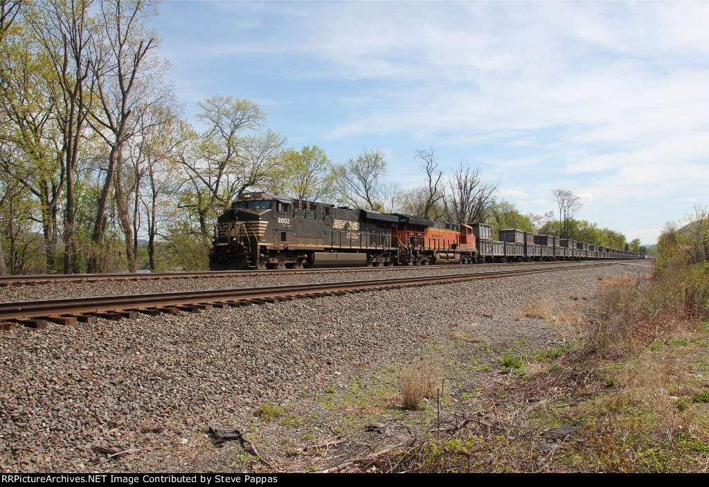 NS 8002 and BNSF 3897 take train 11K west through Cove PA